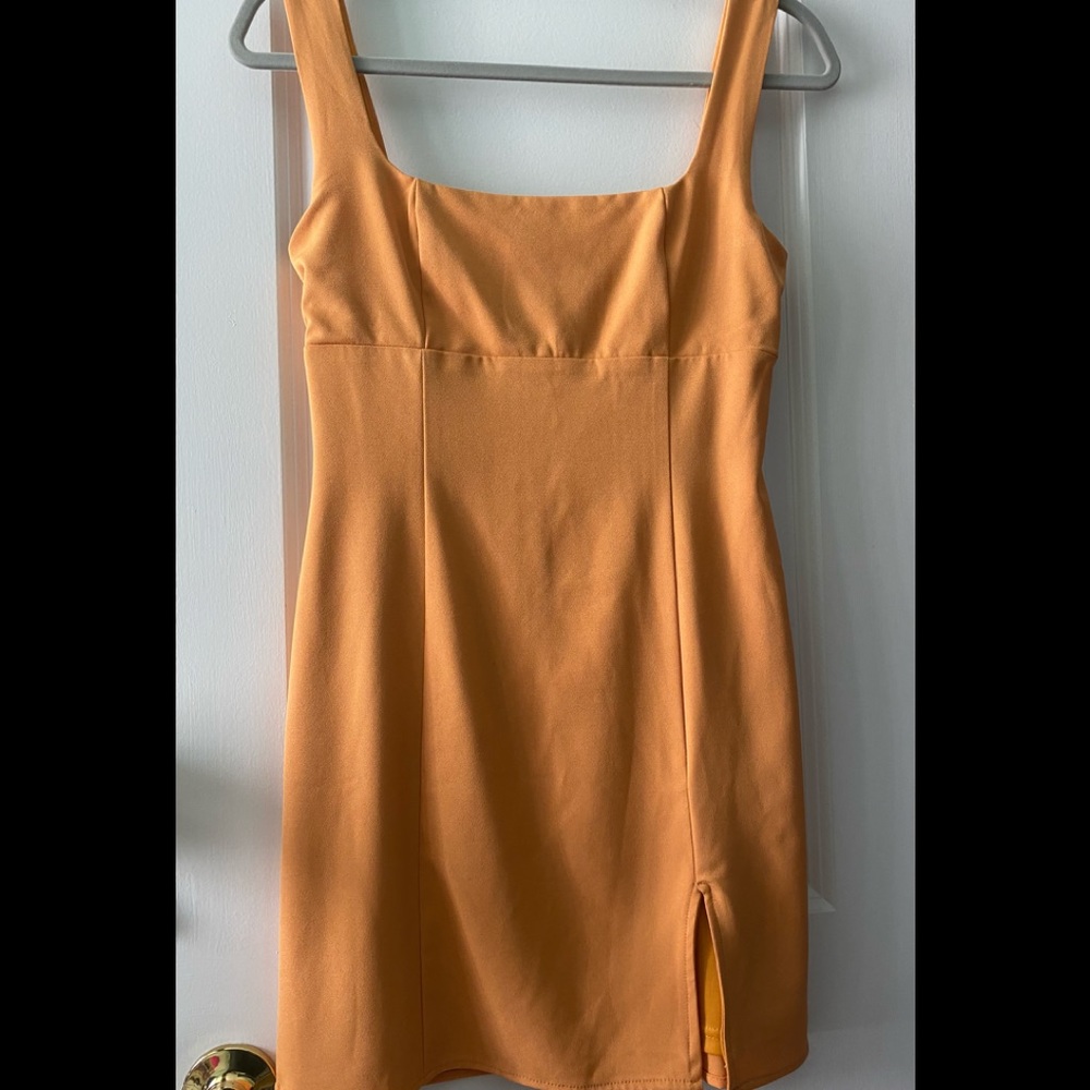 Light orange dress.